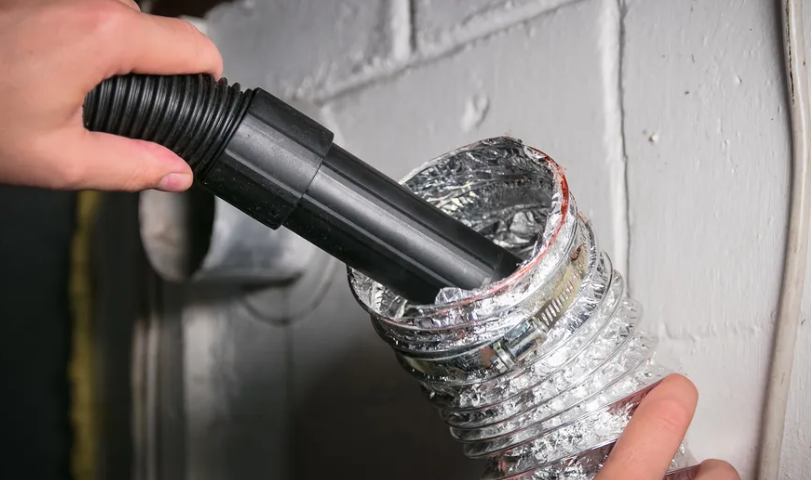 Professional technician working with household equipment